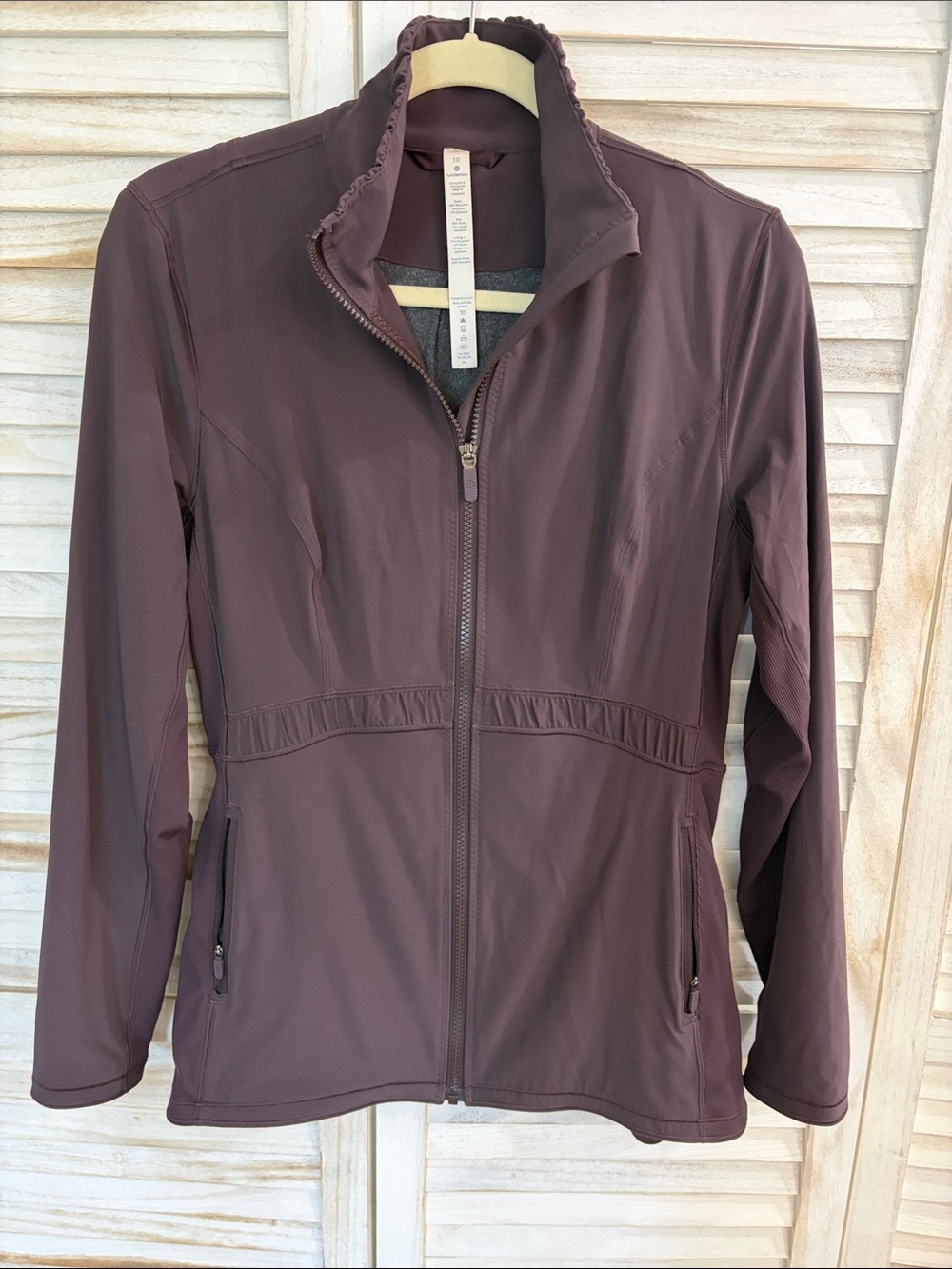 Lululemon Lightweight Full-Zip Jacket in a warm brown color.